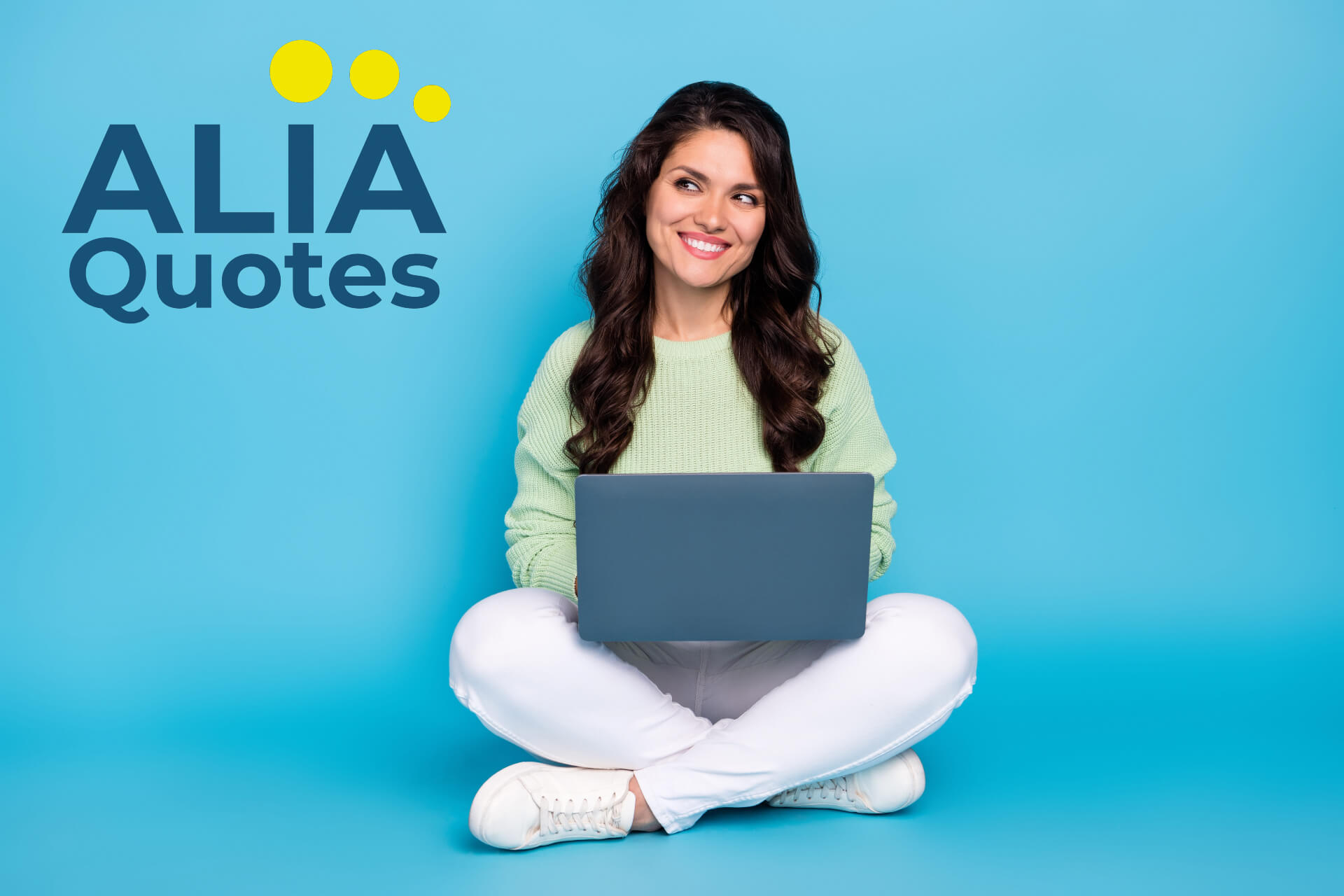 Woman on her laptop looking up at the ALIA Quotes logo.
