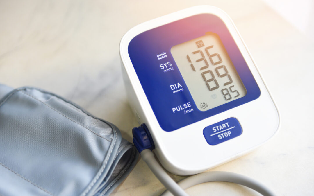 Blood pressure gauge showing a 136 over 89